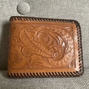 Tooled handmade leather wallet
